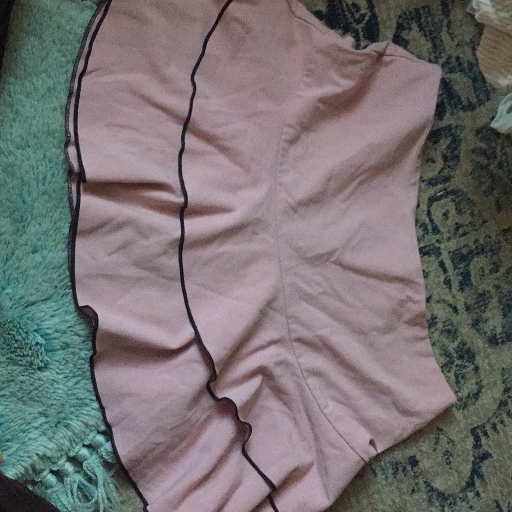 Light pink ruffle mini skirt